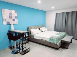 Giường trong phòng chung tại Apricity Suites Aruba