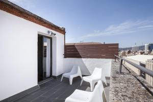 Balkón alebo terasa v ubytovaní Fira Apartments by gaiarooms