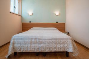 Posteľ alebo postele v izbe v ubytovaní Agriturismo San Francesco
