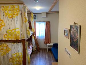 Voodi või voodid majutusasutuse DEER Hostel OSAKA NAMBA toas