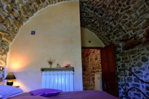 Postel nebo postele na pokoji v ubytování B&B Da Marta