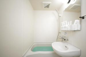 Ένα μπάνιο στο goom Hotel Fukuoka-Kokusai-Center