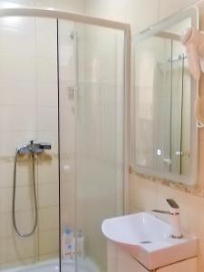 Kúpeľňa v ubytovaní Milky Way Hotel