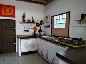 Cucina o angolo cottura di The Sunset Beach House