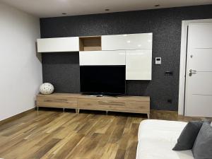 TV in/ali zabaviščno središče v nastanitvi FRAGAGNANO LUXURY HOME