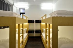 Letto o letti in una camera di Atlas Hostel & Backpackers