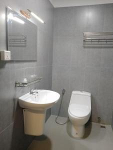 Koupelna v ubytování Shalima Guesthouse + 32 fotografií