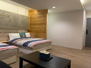 Postel nebo postele na pokoji v ubytování Star Moon Forest Inn