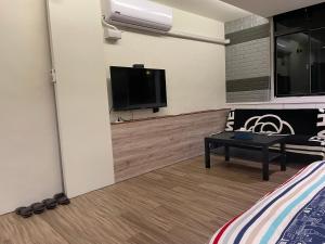 TV a/nebo společenská místnost v ubytování Star Moon Forest Inn