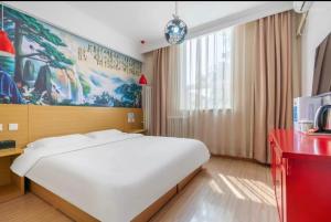 Happy Dragon Alley Hotel-In the city center close to the subway&free coffe laundry Fluent English speaking,Tourist attractions ticket service&food recommendation,Near Tian Anmen Forbiddencity,Near Lama temple,Easy access to the airport客房内的一张或多张床位