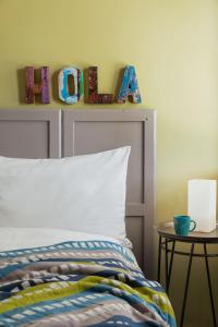 A bed or beds in a room at Casa Alicante - Relax in a unique environment