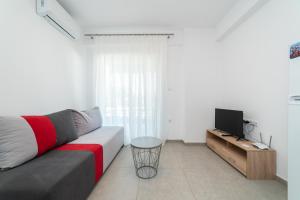 TV o dispositivi per l'intrattenimento presso Danai & Palm Residential Complexes