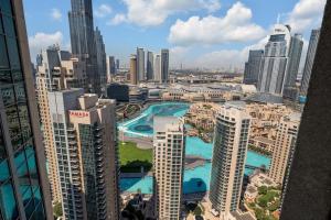 a view of a city with tall buildings at 29Blvd BurjView in Dubai