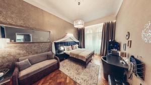 Posteľ alebo postele v izbe v ubytovaní Alfons Boutique Hotel