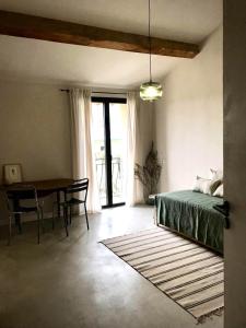 Postel nebo postele na pokoji v ubytování Felix - Maison d'hôtes
