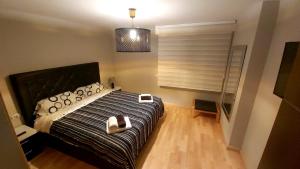 Posteľ alebo postele v izbe v ubytovaní APARTAMENTO LA CALA DE MIJAS VITANIA COSTA DEL SoL