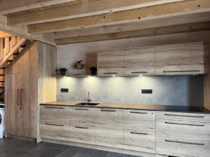 Kuchyňa alebo kuchynka v ubytovaní Chalet L'Ôbresse + 28 fotografií