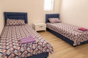 Ένα ή περισσότερα κρεβάτια σε δωμάτιο στο Apartmani Marojević, Bar +84 φωτογραφίες