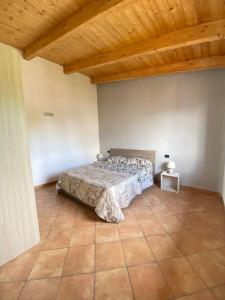 Ένα ή περισσότερα κρεβάτια σε δωμάτιο στο Appartamento dell' Arco Romano