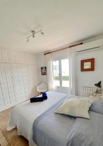 Posteľ alebo postele v izbe v ubytovaní Apartamento estilo Mediterráneo. Segundo Montañar.
