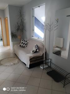 Posteľ alebo postele v izbe v ubytovaní Apartament przy Słonecznej