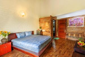 Calm House 2 HOSTEL客房内的一张或多张床位