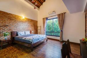 Calm House 2 HOSTEL客房内的一张或多张床位