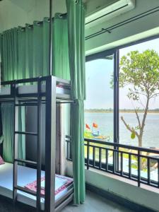 Calm House 2 HOSTEL客房内的一张或多张床位
