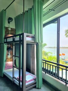 Calm House 2 HOSTEL客房内的一张或多张床位