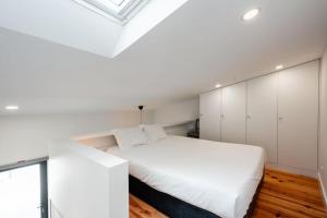 Postel nebo postele na pokoji v ubytování House Páteo da Lapa 5