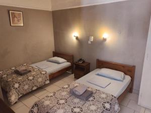 Postel nebo postele na pokoji v ubytování Miranta Hotel - Apartments & Studios