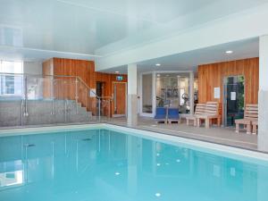 a large swimming pool in a house at Buzzard in Blackawton