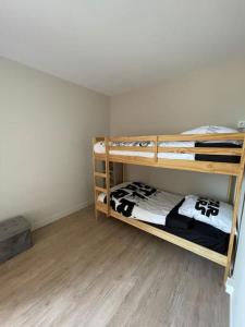 Posteľ alebo postele v izbe v ubytovaní Appartement vu mer + 8 fotografií
