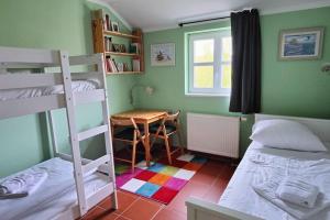 Postel nebo postele na pokoji v ubytování Strandläufer
