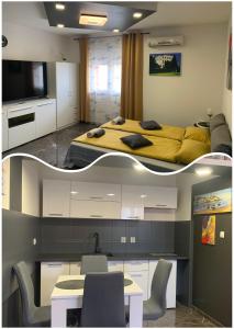 1 dormitorio con 1 cama, mesa y sillas en Studio DAMA blizina amfiteatra i bus kolodvora ,privatan parking ,Self-Check- In, en Pula