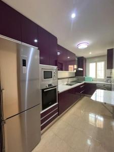 Η κουζίνα ή μικρή κουζίνα στο Apartamento a pie de playa con vistas al mar.