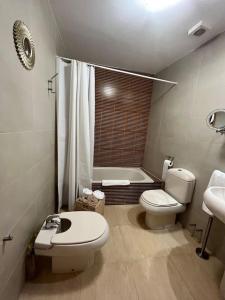 Ένα μπάνιο στο Apartamento a pie de playa con vistas al mar. +14 φωτογραφίες