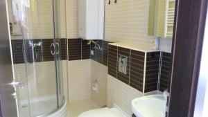 Kúpeľňa v ubytovaní Azur Wellness Apartman