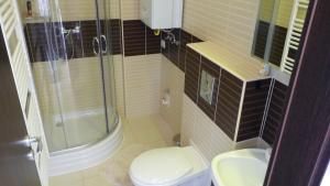 Kúpeľňa v ubytovaní Azur Wellness Apartman