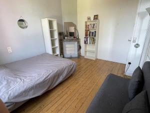 Posteľ alebo postele v izbe v ubytovaní Grande Maison Familiale à Nantes avec Piscine