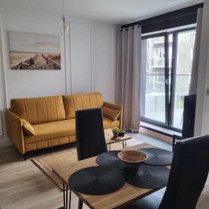 Khu vực ghế ngồi tại LIKE A BOSS Executive Apartment Gdynia City Center Bank Polski 1929