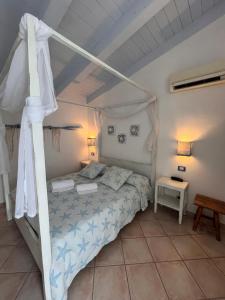 Postel nebo postele na pokoji v ubytování Hotel Tabby