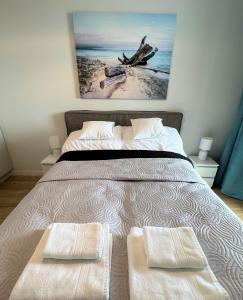 Posteľ alebo postele v izbe v ubytovaní Apartament nad morzem BAY VIEW