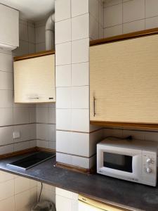 A kitchen or kitchenette at Apartamentos Olano C.B.