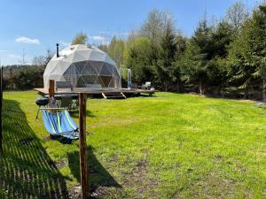 Zahrada ubytování Tatra Glamp Mazury - sieć noclegowa Tatra Glamp