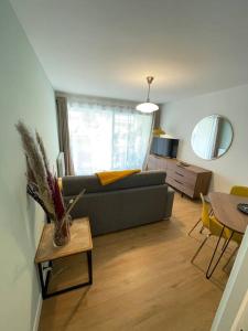 Część wypoczynkowa w obiekcie Studio Suzanne proche des commerces & de la plage
