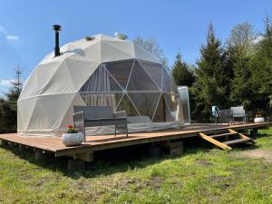 Zahrada ubytování Tatra Glamp Mazury - sieć noclegowa Tatra Glamp