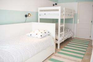Łóżko lub łóżka w pokoju w obiekcie Villa Ersanavera