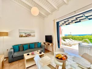 Posezení v ubytování Villa Barbati Thalassaki with private pool by DadoVillas