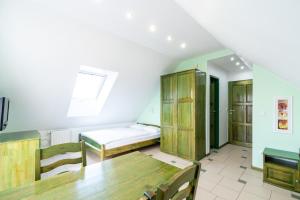 Postel nebo postele na pokoji v ubytování Villa & Domek Maja